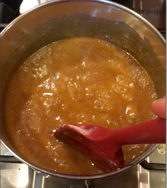 Hot, bubbling caramel after the ghee and goat milk cream are added in